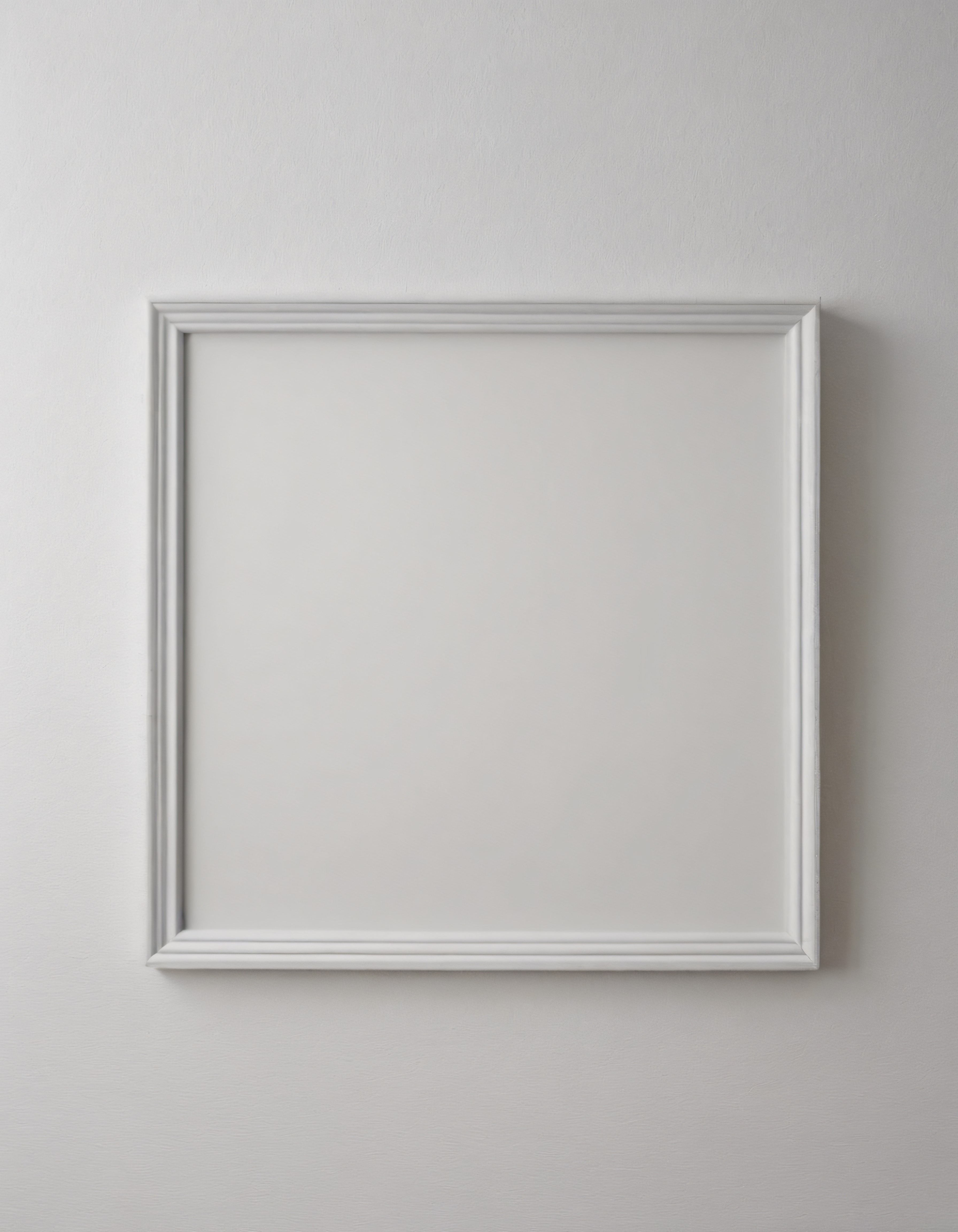 Beyaz duvara asılı boş beyaz çerçeve minimalist iç mekan dekorasyonu