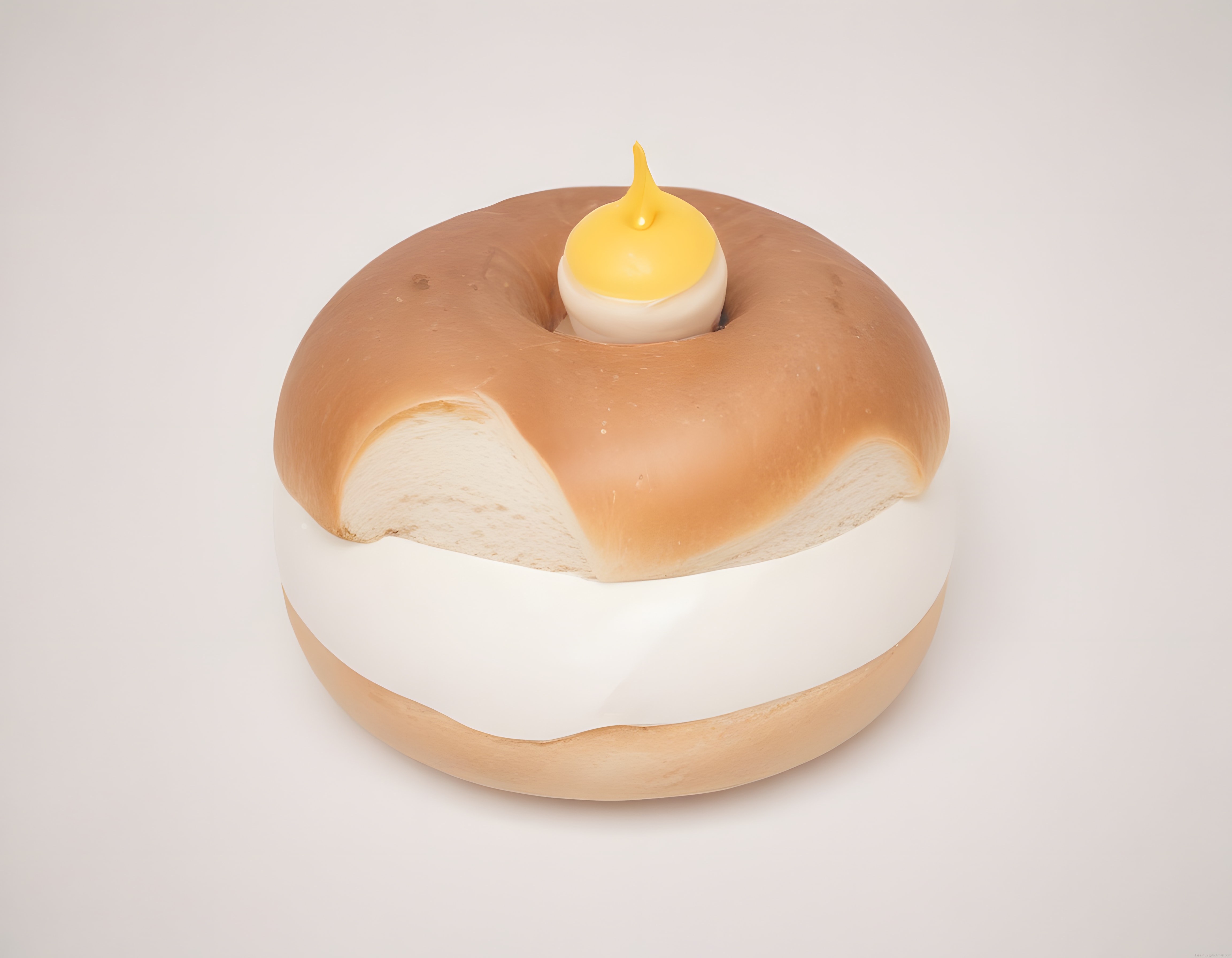 Fırından yeni çıkmış gibi duran simit şeklindeki dekoratif mum objesi