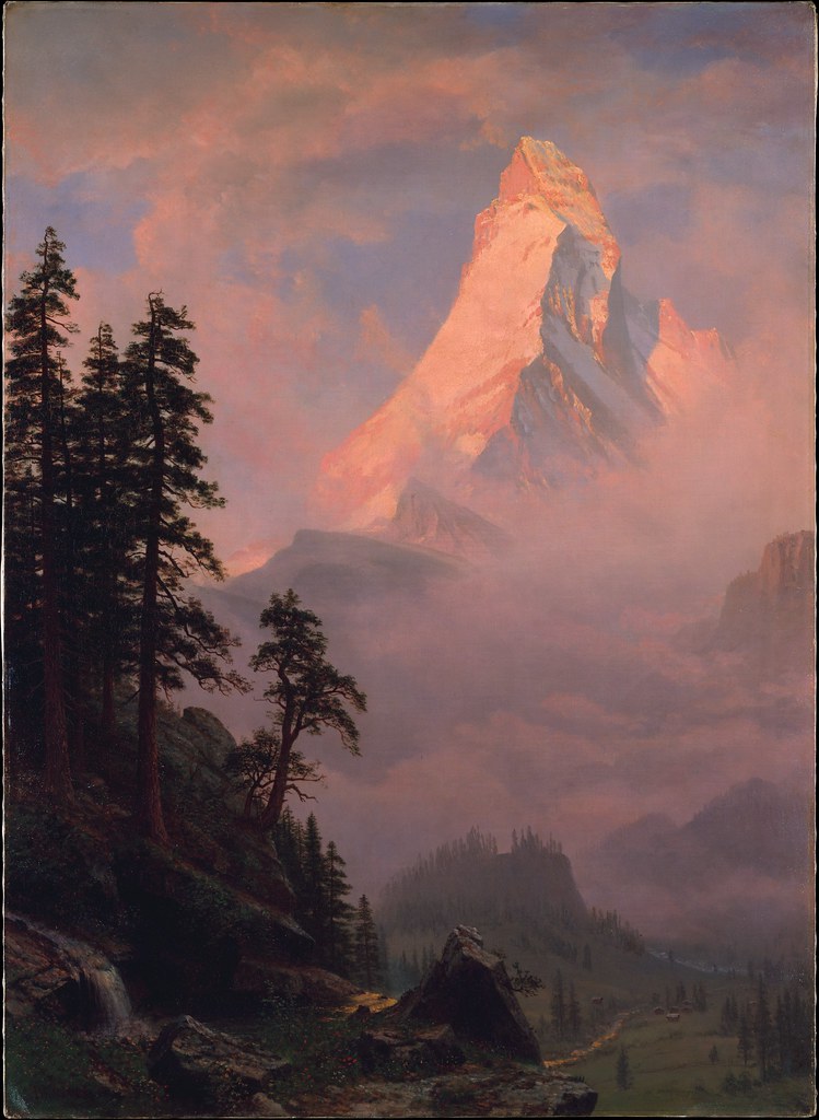 Gün Batımında Matterhorn Zirvesi ve Sisli Alpler Vadisinde Romantik Manzara