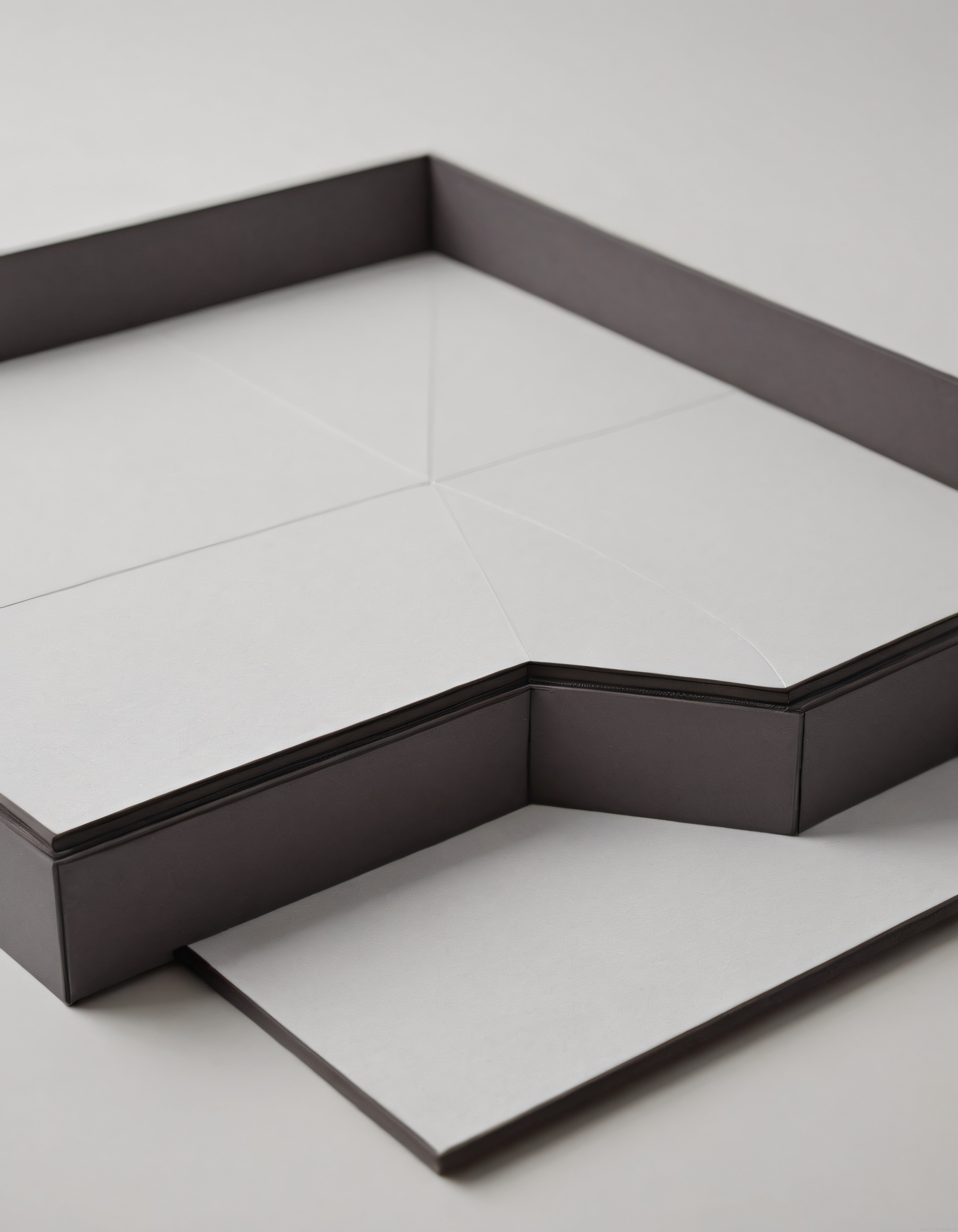 Modern minimalist tepsi ve kutu tasarımıyla siyah beyaz geometrik dekor detayı