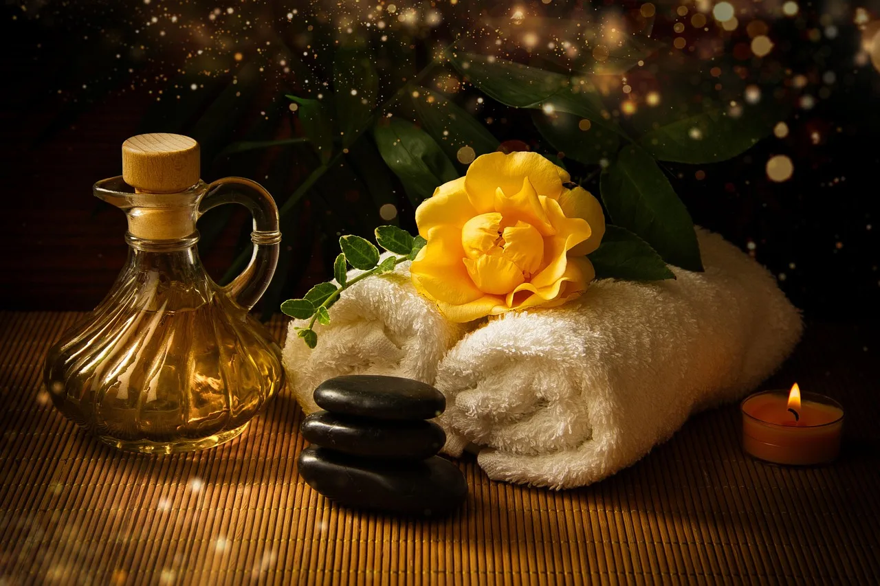 Spa masaj yağıyla çiçekli rahatlama köşesi