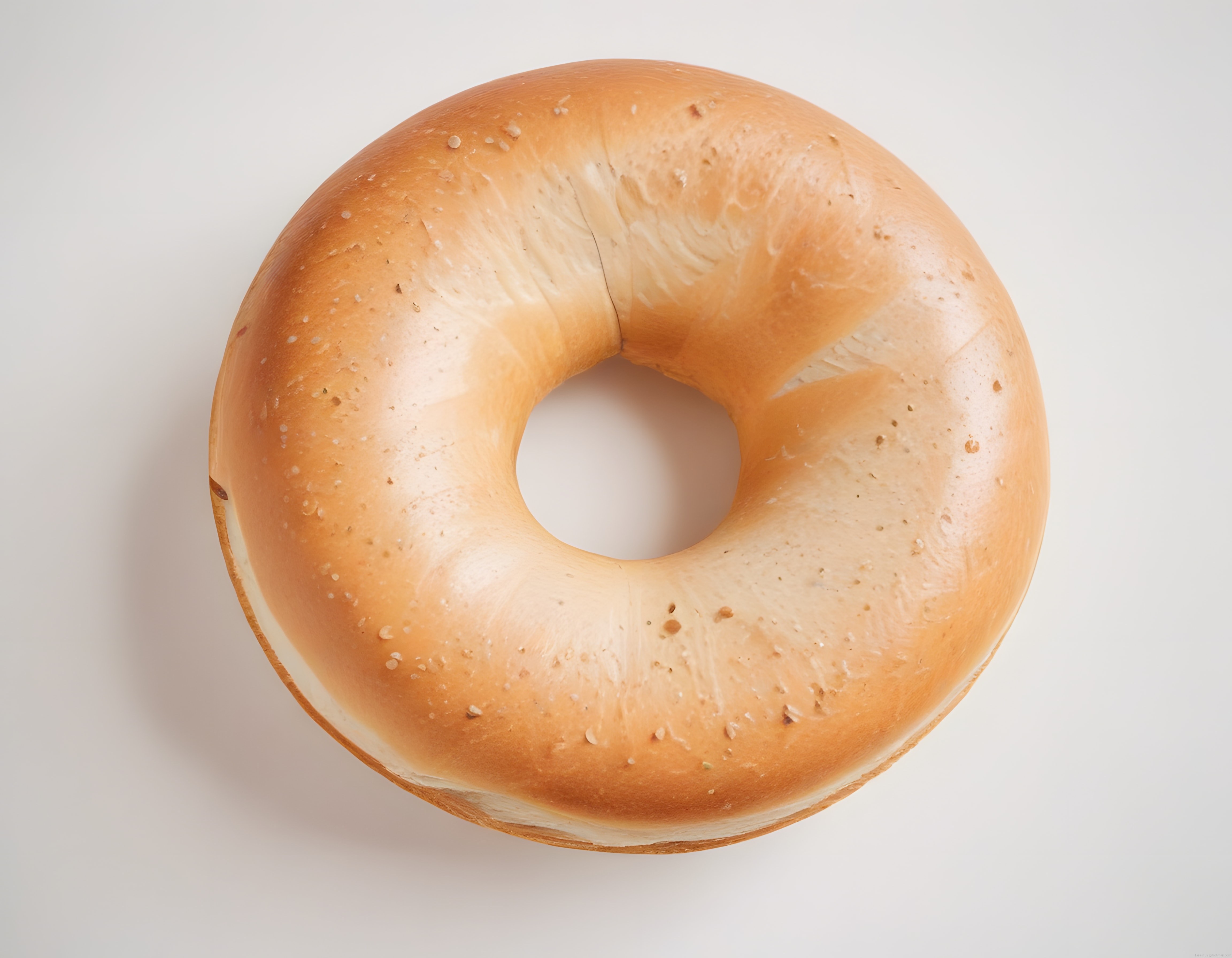 Taze ve Yumuşak Bagel: Beyaz Arka Plan Üzerinde Altın Rengi Kahvaltı Ekmeği