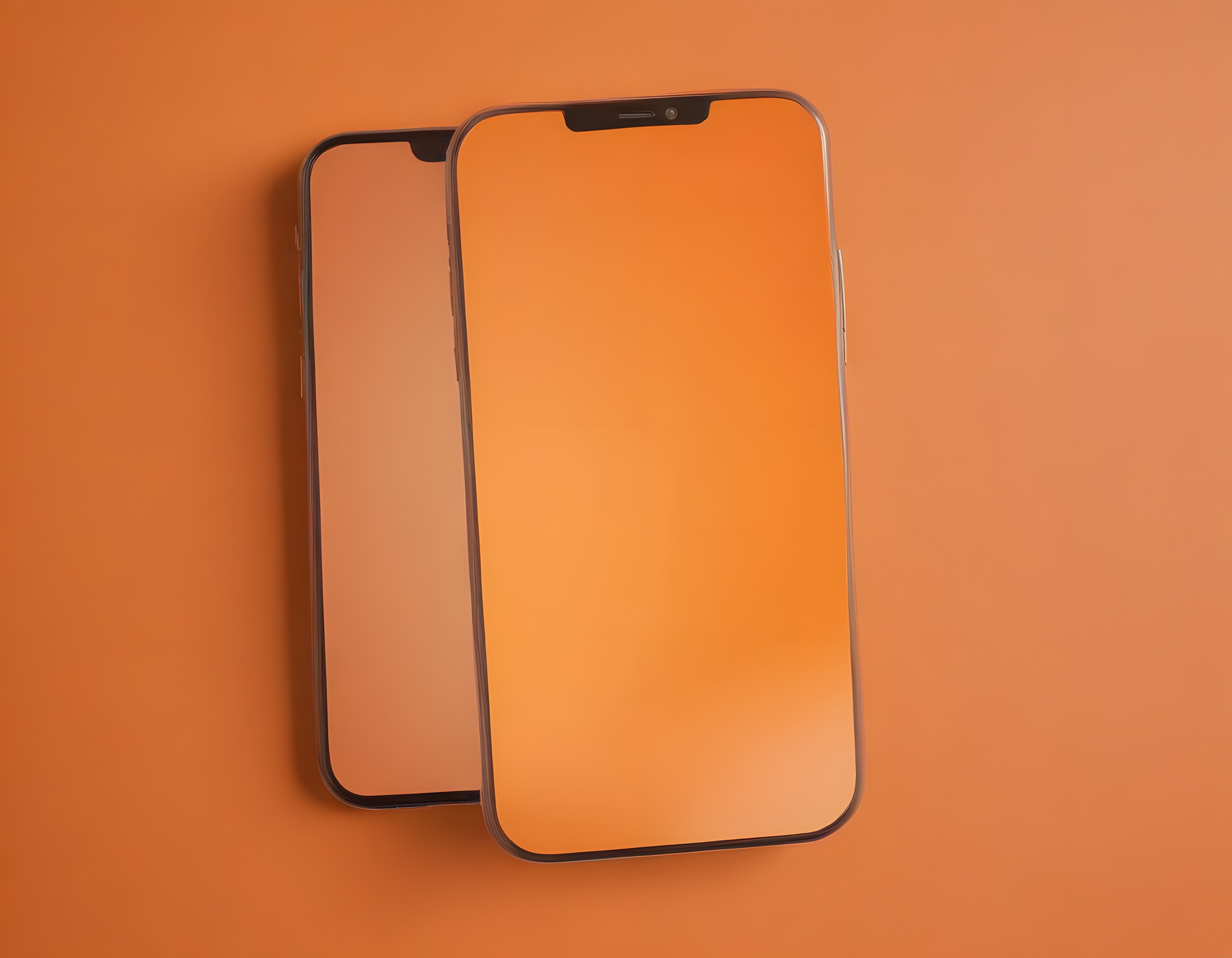 Turuncu zeminde modern akıllı telefonlar ve boş ekranlı mobil mockup